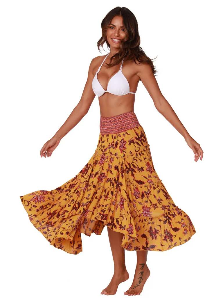 Smocked waist ruffle skirt in a vividly printed floral